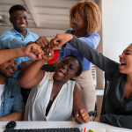 Happy black performing team members